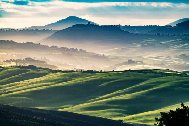 istock Sunny landscape from Val d'Orcia, Tuscany, Italy 1058079052