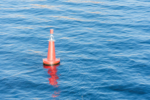istock Buoy in the water on the bay, top view with empty space. 1058093556