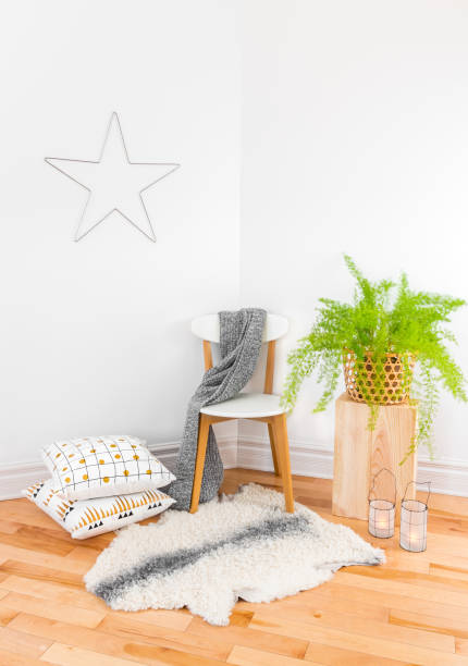 Beautiful home decor with cozy textiles and green plant