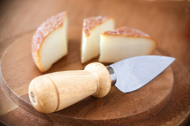 istock Parmesan Cheese with knife 1058103180