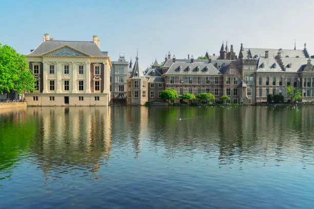 city center of Den Haag - Dutch pairlament Binnenhof, Mauritshuis and with reflections in pond, Netherlands