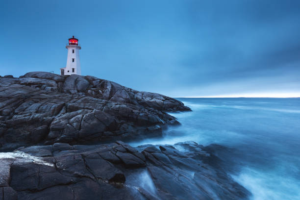 istock Peggy's Cove Lighthouse at dusk 1058106422