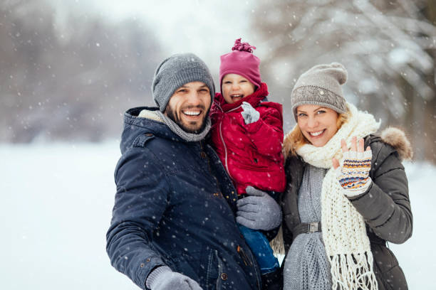 istock Happy family enjoying winter day 1058108838