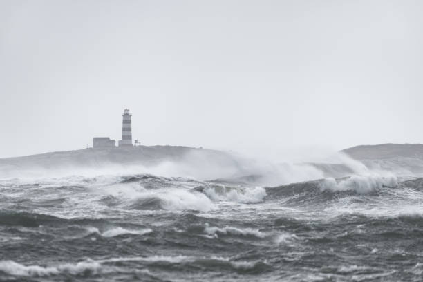 istock Turbulent ocean lighthouse 1058110038