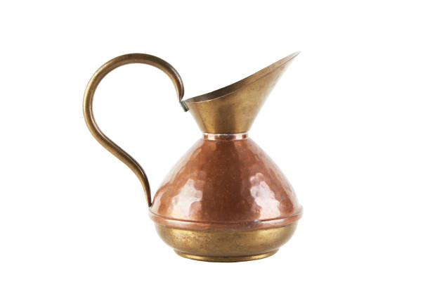 istock Vintage copper brass jug isolated on white 1058118128