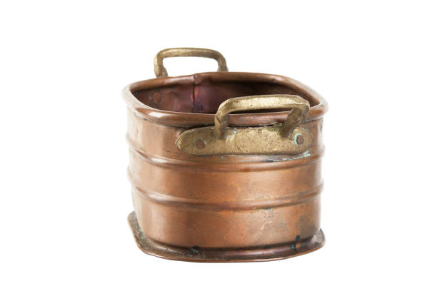istock Vintage flower pot isolated on white 1058118304