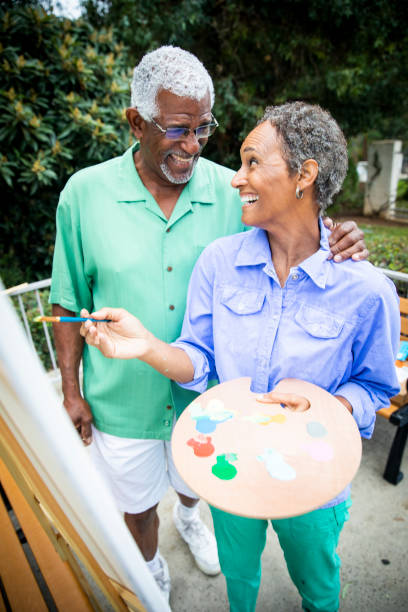 istock Senior Black Couple Painting on Canvas 1058122434