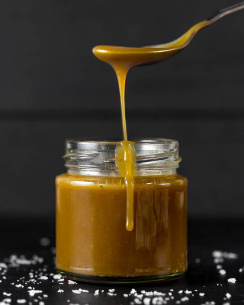 istock Caramel sauce in jar 1058140218