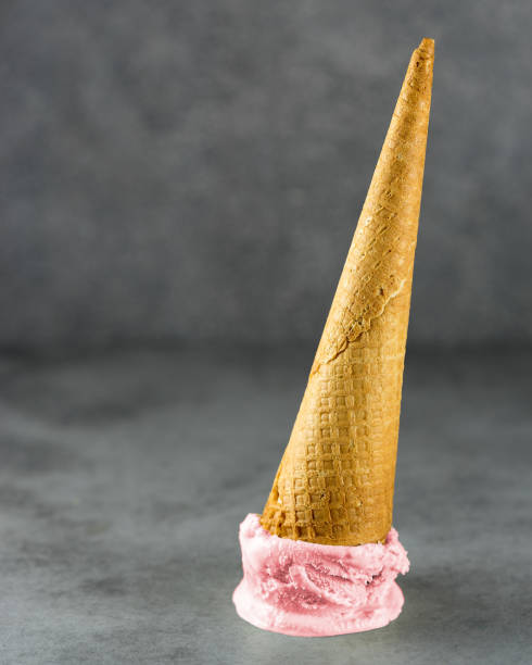 istock Dropped ice cream cone on concrete,melting 1058140236