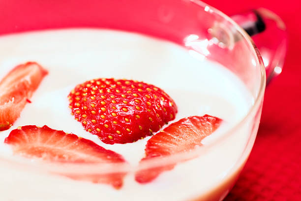 strawberries in milk stock photo