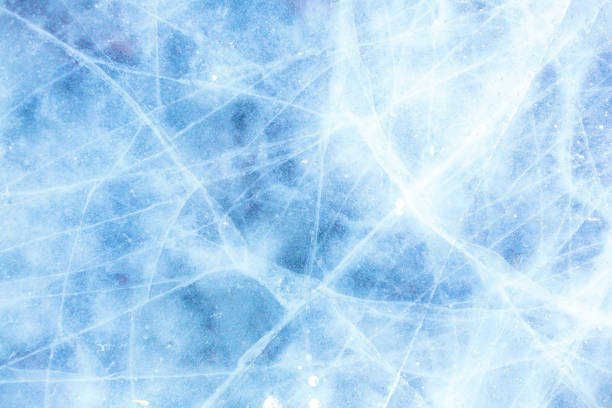 istock texture of a beautiful blue ice with cracks 1058161018