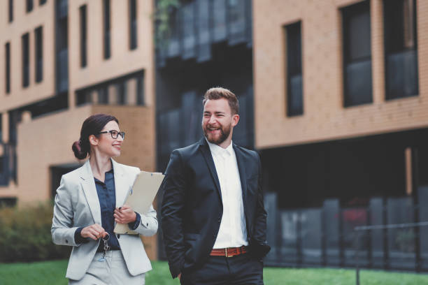 istock Real estate agent and businessman customer 1058161074
