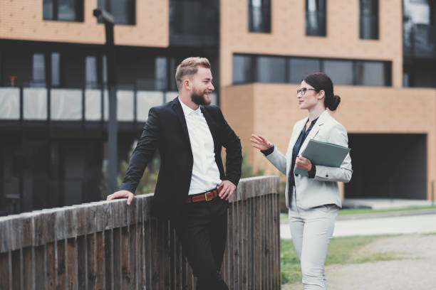 istock Real estate agent and businessman customer 1058161150