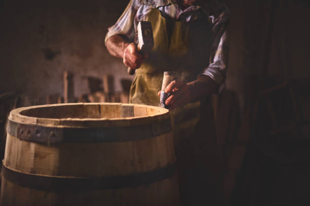 istock Wooden Barrels in a cooperage, barrel workshop 1058161756