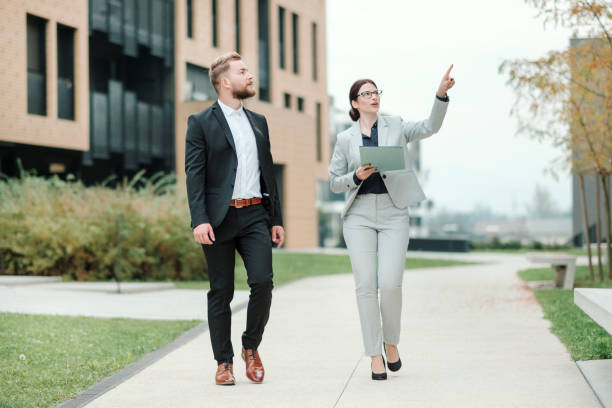 istock Real estate agent and businessman customer 1058163014