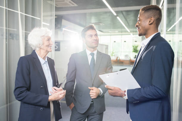 istock Content business colleagues communicating in office 1058163294