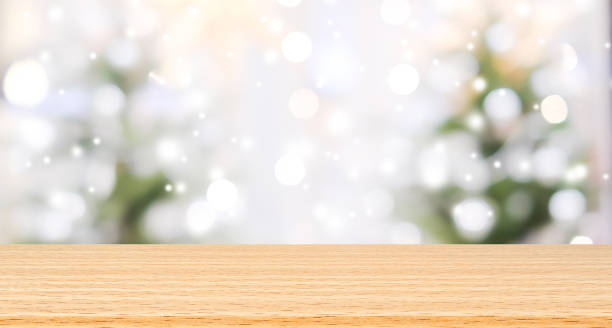 istock Blur Christmas celebrations decorations background with ancient wooden plank perspective  for advertising or promote product on picture. 1058163612