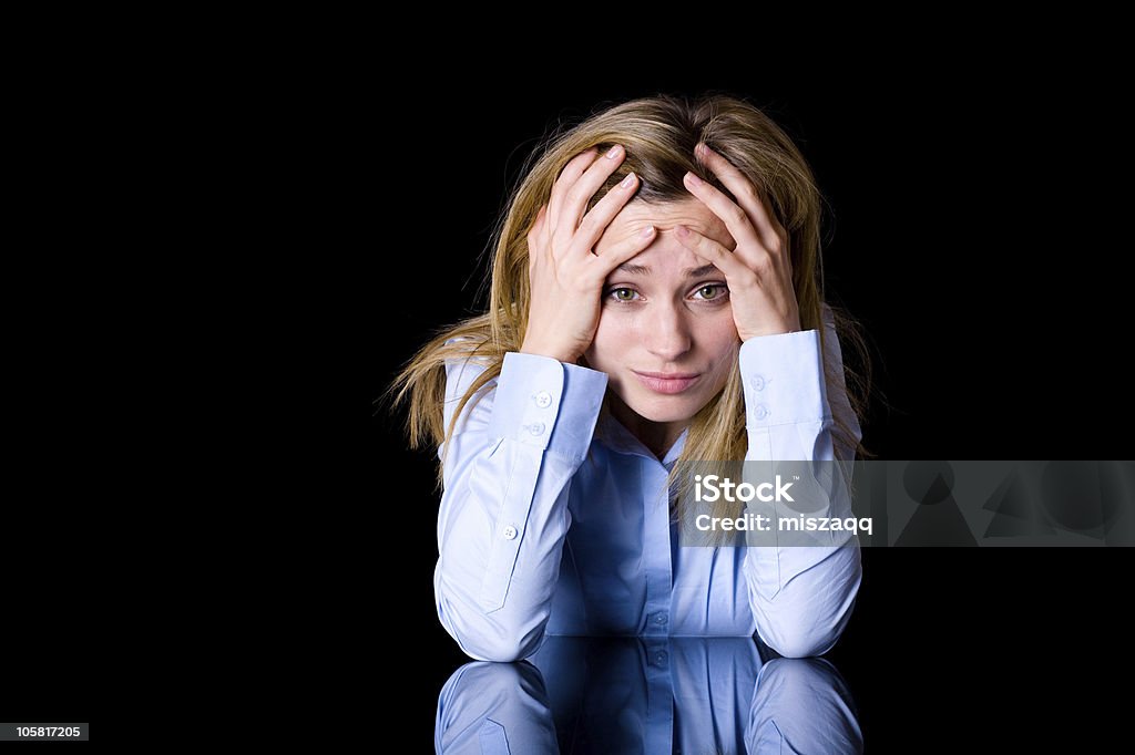 depression, headache, attractive blond female isolated on black  Human Face Stock Photo