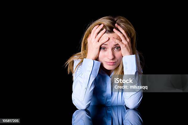 Depression Headache Attractive Blond Female Isolated On Black Stock Photo - Download Image Now