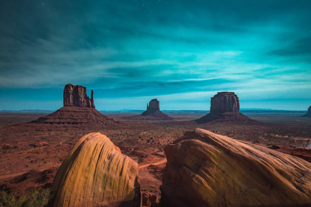 istock Monument Valley in moonlight, Arizona, USA 1058180304