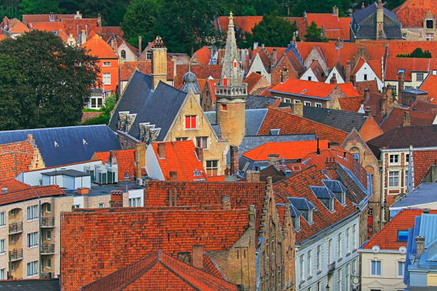 istock Above Bruges rooftops and towers - medieval old town - Belgium 1058186038