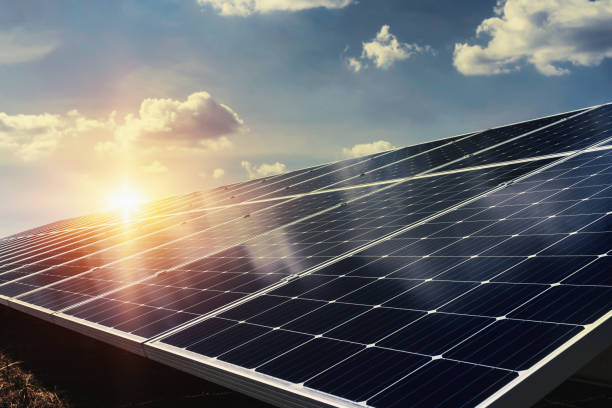 istock solar panel with sunlight and blue sky background. concept clean energy power in nature 1058186198