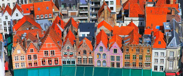 istock Above Bruges rooftops architectural pattern - colorful medieval old town - Belgium 1058194050