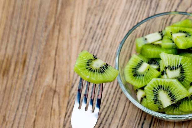 istock A plate of kiwi fruit slices with fork 1058195946