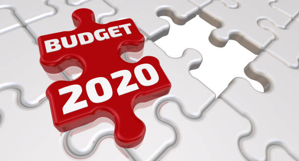 istock Budget 2020. The inscription on the missing element of the puzzle 1058196356