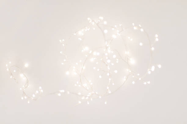 istock Abstract Silver Christmas Winter Background with festive glowing bokeh lights, copyspace 1058206820