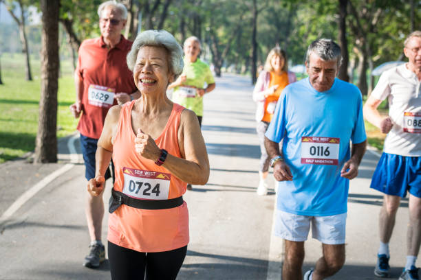 istock Senior athletes running in the park 1058206944