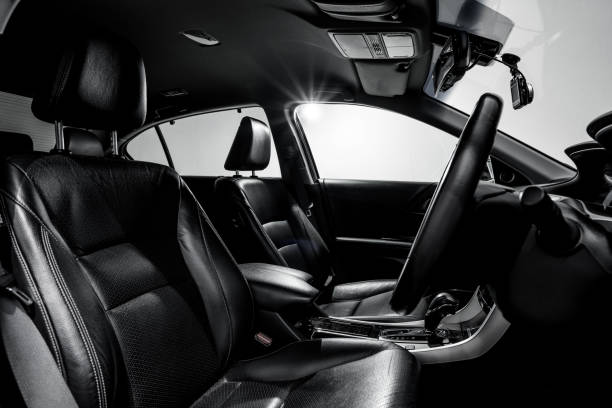 Clean console modern car, black indoor design.