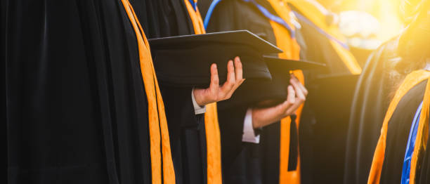 Close up Graduate holding a hat. Concept sucess education in University.