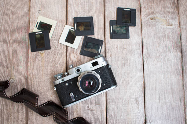 istock old camera, film and photo slides 1058214802