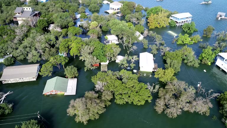 Moving around entire flooded area, a disaster zone , Historic Flooding along Colorado River leaves Homes Flooded and Under water