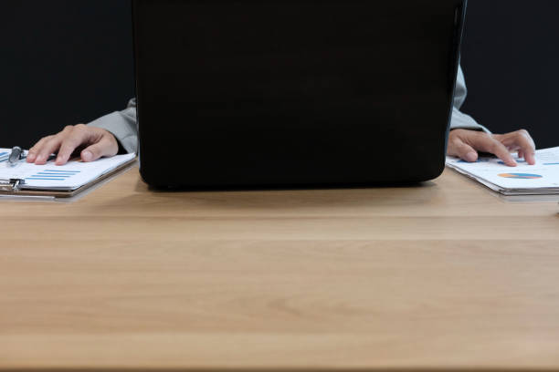 istock businessman working with document. startup man analyze financial data at workplace. 1058225214