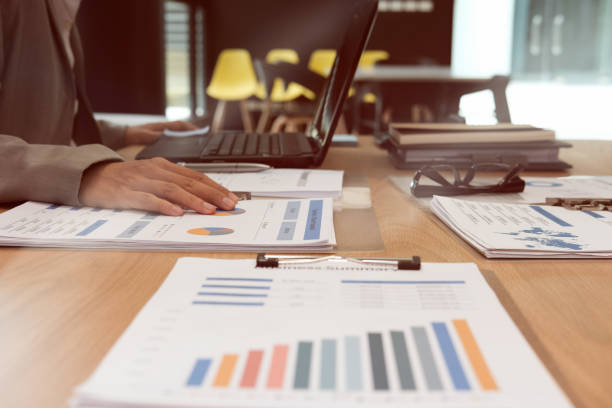 istock businessman working with document. startup man analyze financial data at workplace. 1058225240