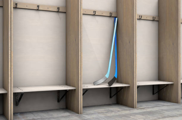 istock Change Room And Hockey Sticks 1058231970