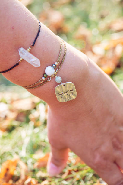 istock female wrist with jewelry 1058235030
