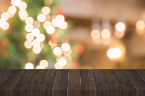 istock wooden plank with christmas light blurred background 1058238494