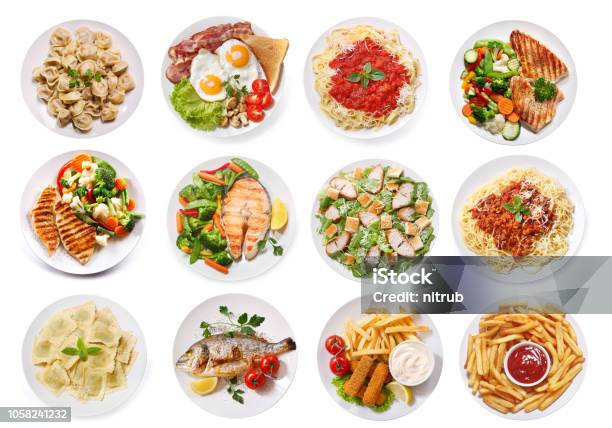 Various Plates Of Food Isolated On White Background Top View Stock Photo - Download Image Now