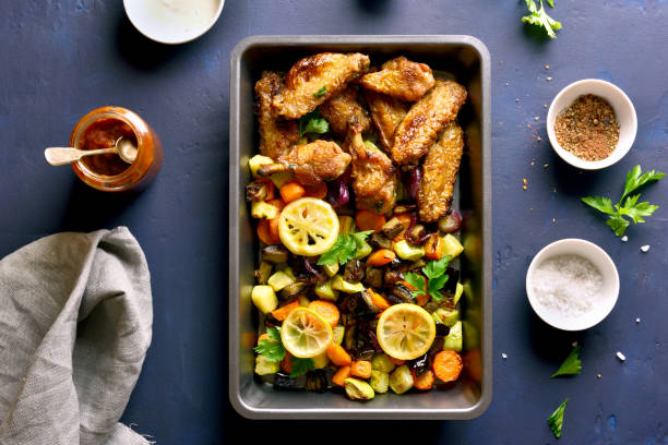 istock Grilled vegetables with chicken wings 1058242638