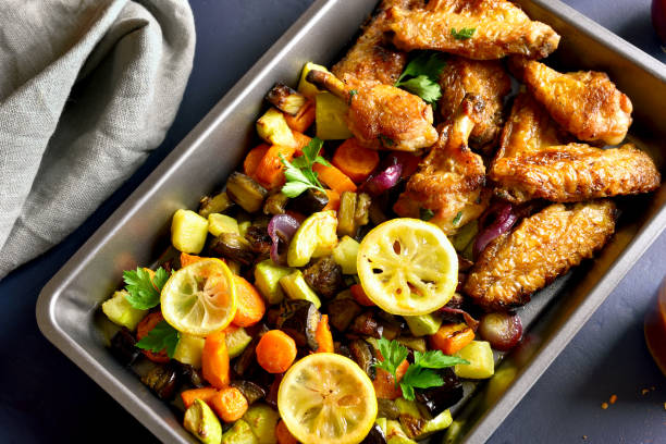 istock Grilled vegetables with chicken wings 1058242664
