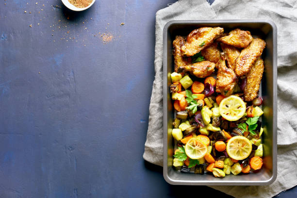 istock Grilled vegetables with chicken wings 1058242682