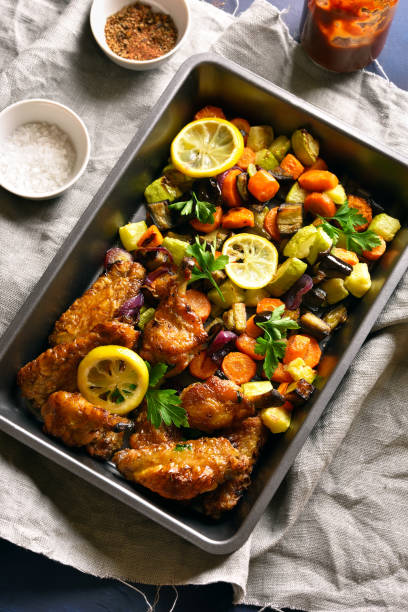 istock Grilled vegetables with chicken wings 1058242712