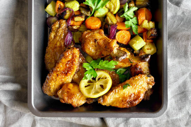 istock Grilled vegetables with chicken wings 1058242730