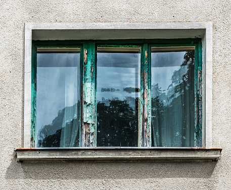 Still useful old window from communism century in Transylvania.