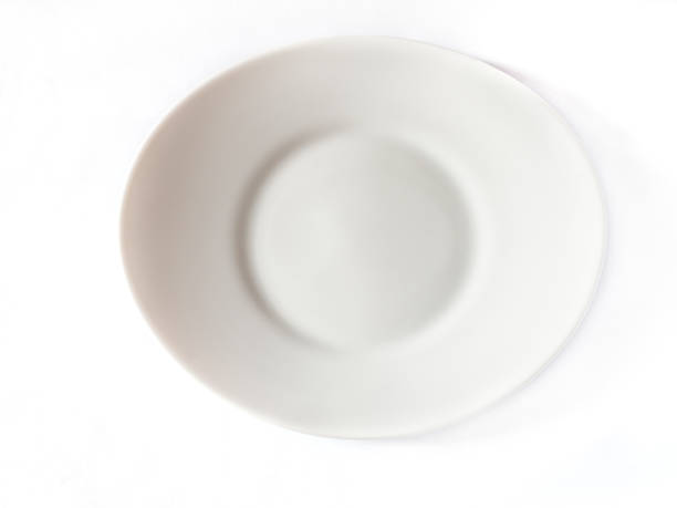 istock White porcelain dish empty on white background. 1058244406
