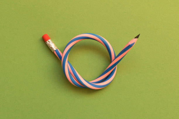 istock Flexible pencil . Isolated on dark green background 1058249968