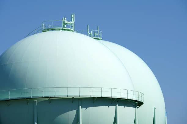 Sphere gas tanks Sphere gas tanks in petrochemical plant against the blue sky lng liquid natural gas stock pictures, royalty-free photos & images